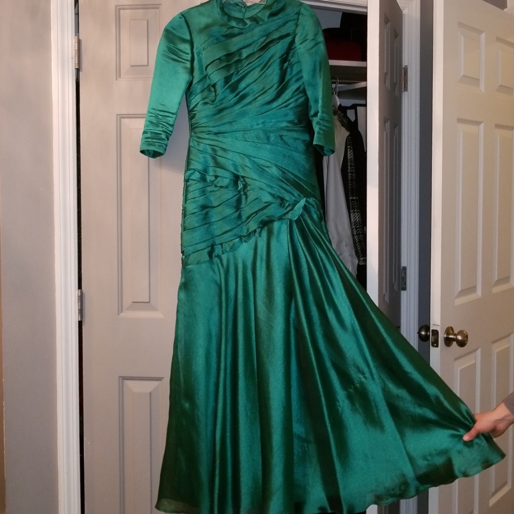 Emerald green long bridesmaid gown.